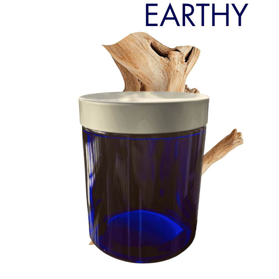 Earthy grounded luxury soy fragrance scents bringing calm, amber, warm and woody lab-tested oils.