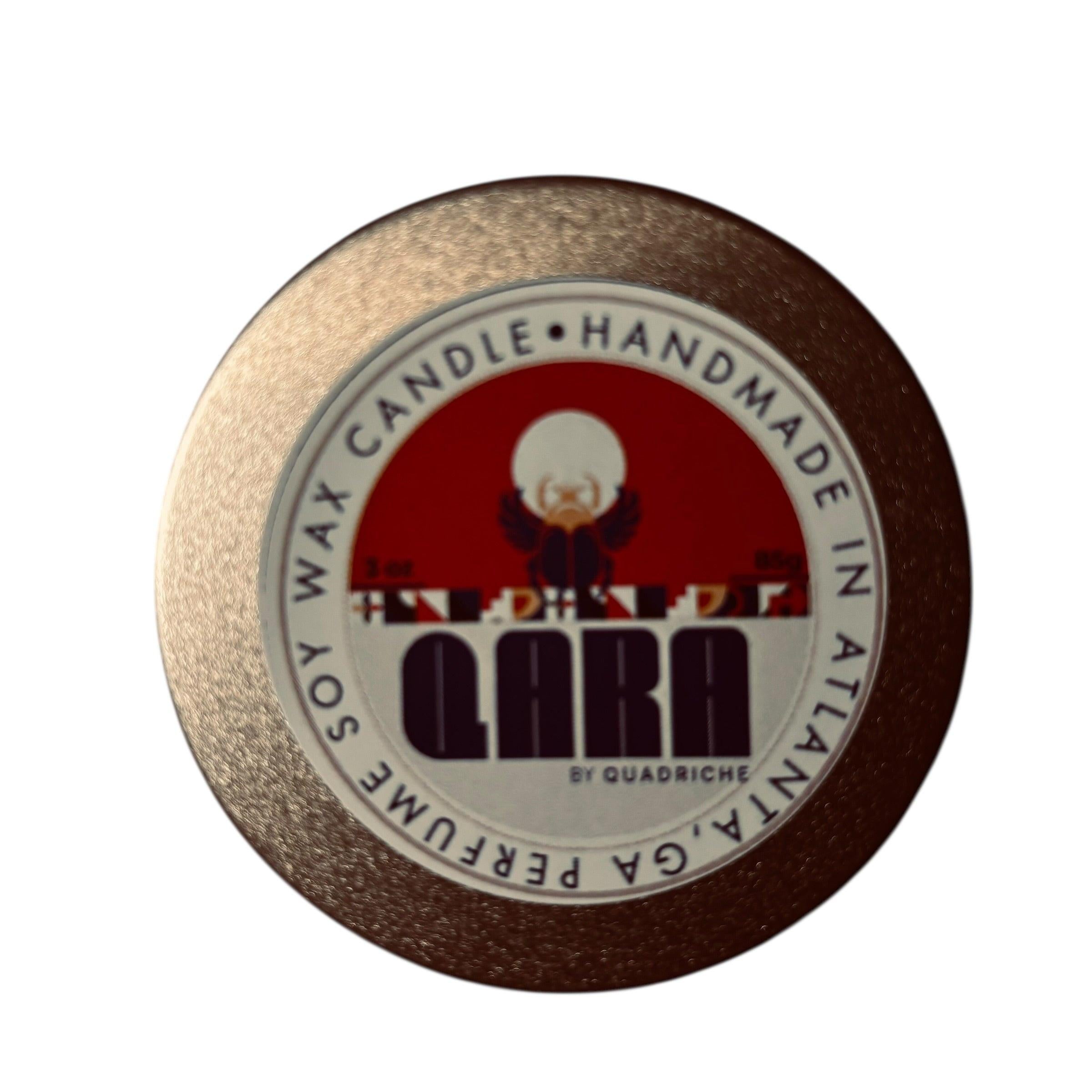 Round label with 'Qara by quadriche' branding on a white background Cherry blossom fragrance