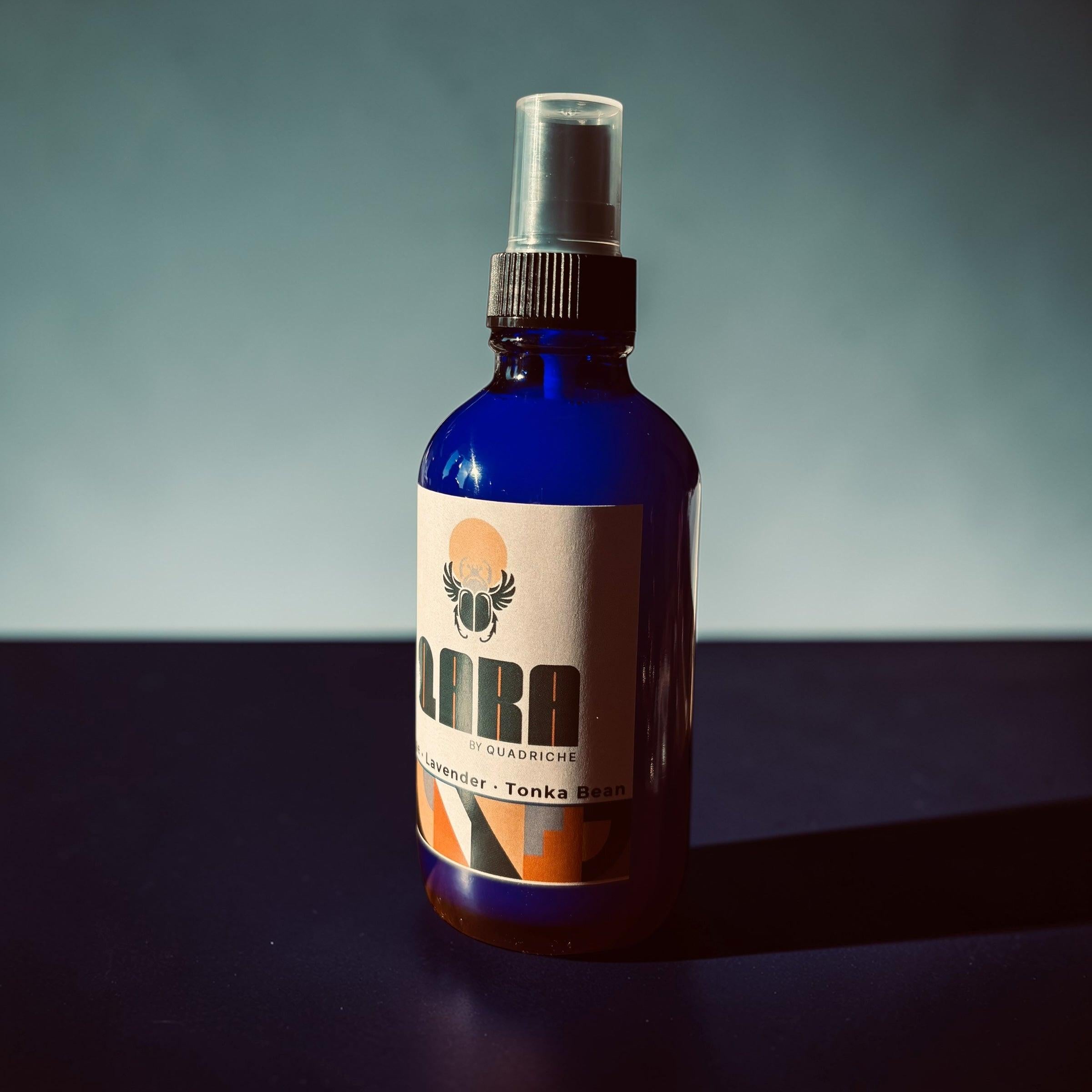 Sacred Ground QARA by Quadriche oakmoss room & linen scented spray in cobalt blue glass spray bottle