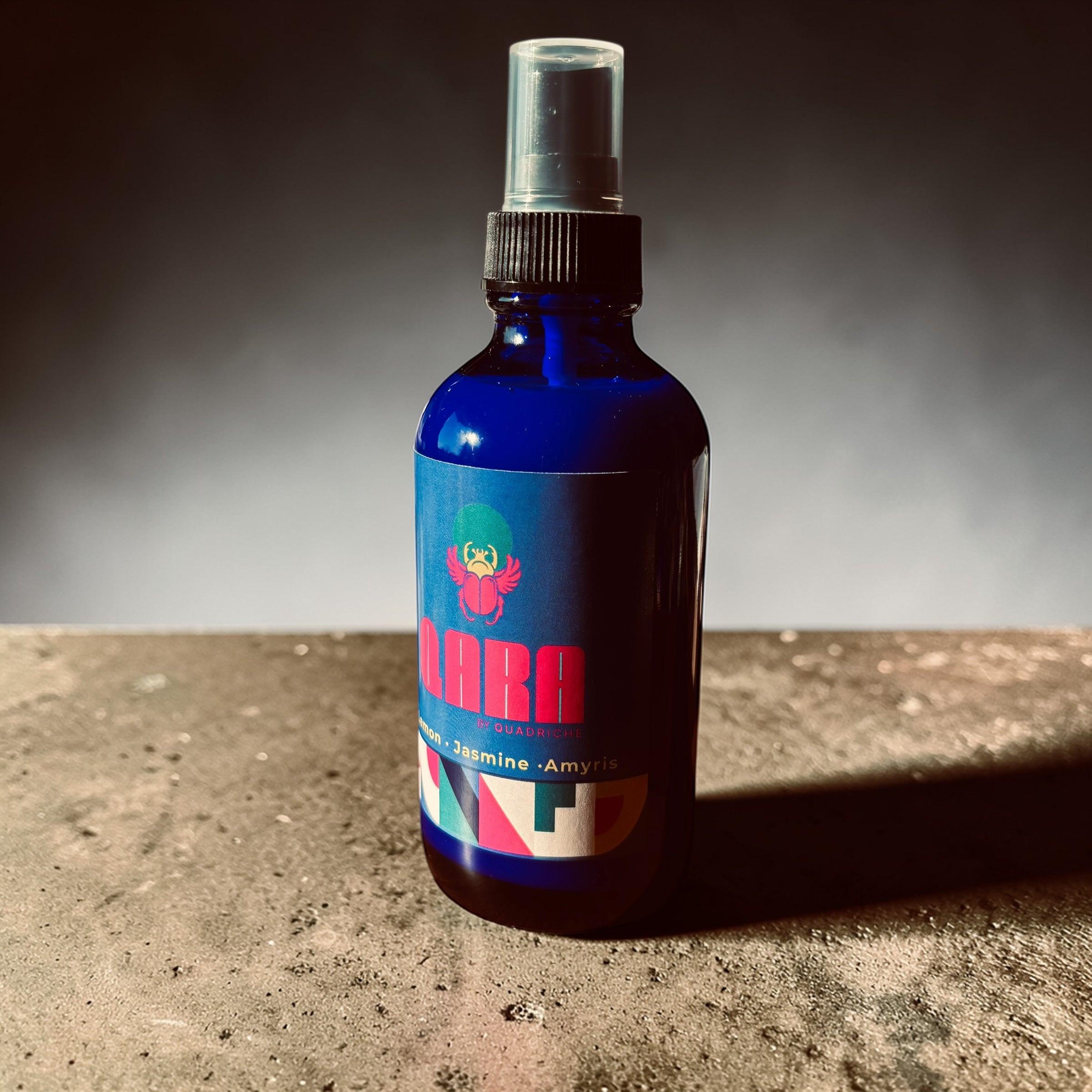 Seventh Bloom QARA by Quadriche jasmine room & linen scented spray in cobalt blue glass spray bottle