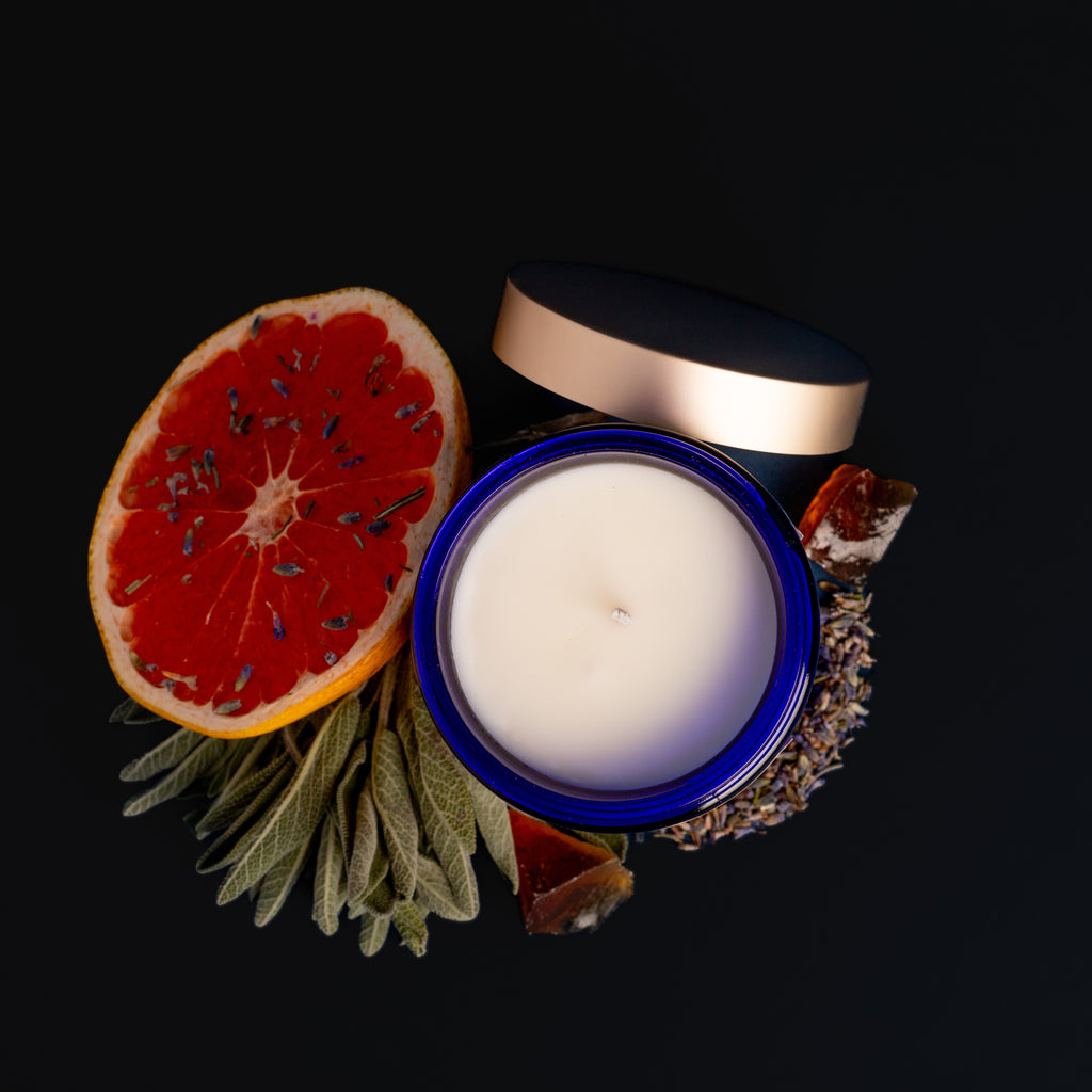 Top view of Māori Forest soy candle with smooth clean-burning wax in cobalt glass – luxury home fragrance by Quadriche Atlanta